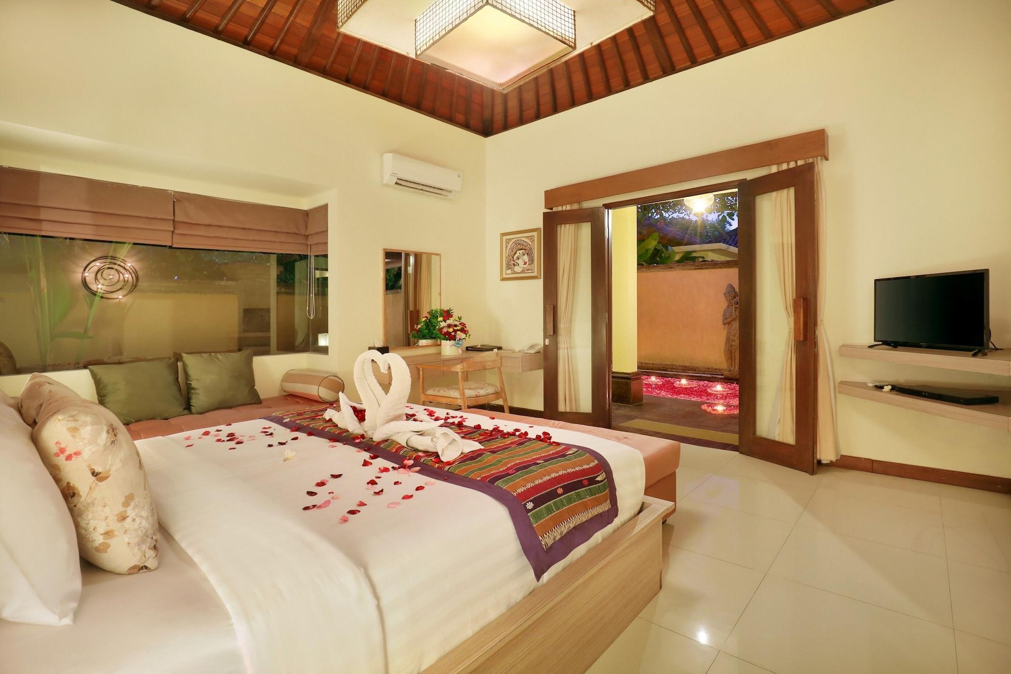 Sagara Villas And Suites Sanur By Ahm Exterior foto A bedroom at the resort