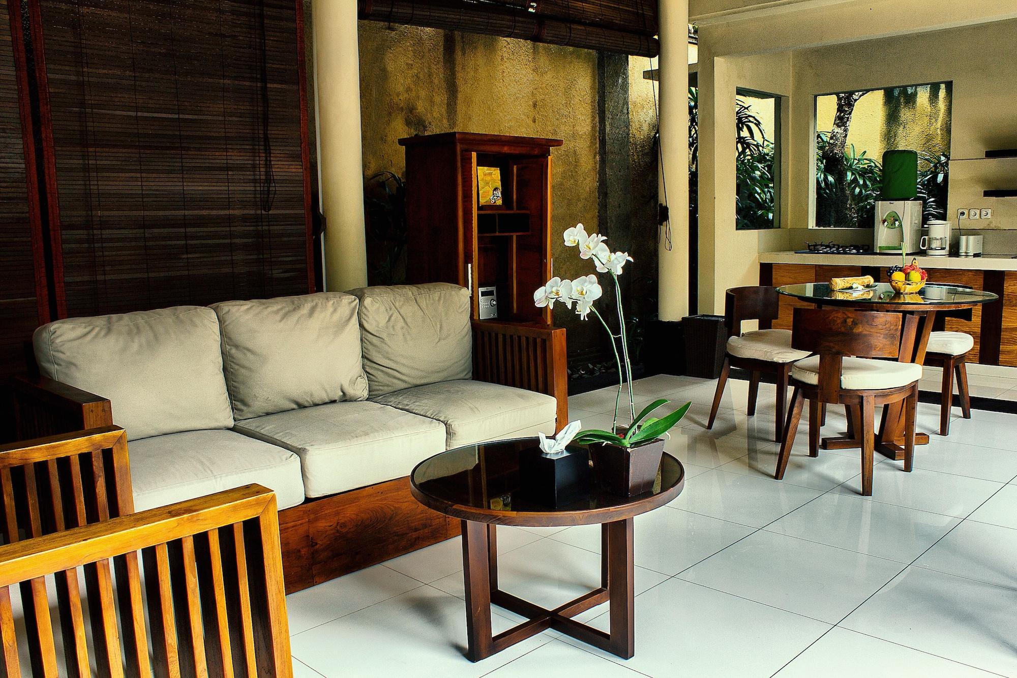 Sagara Villas And Suites Sanur By Ahm Exterior foto A living room