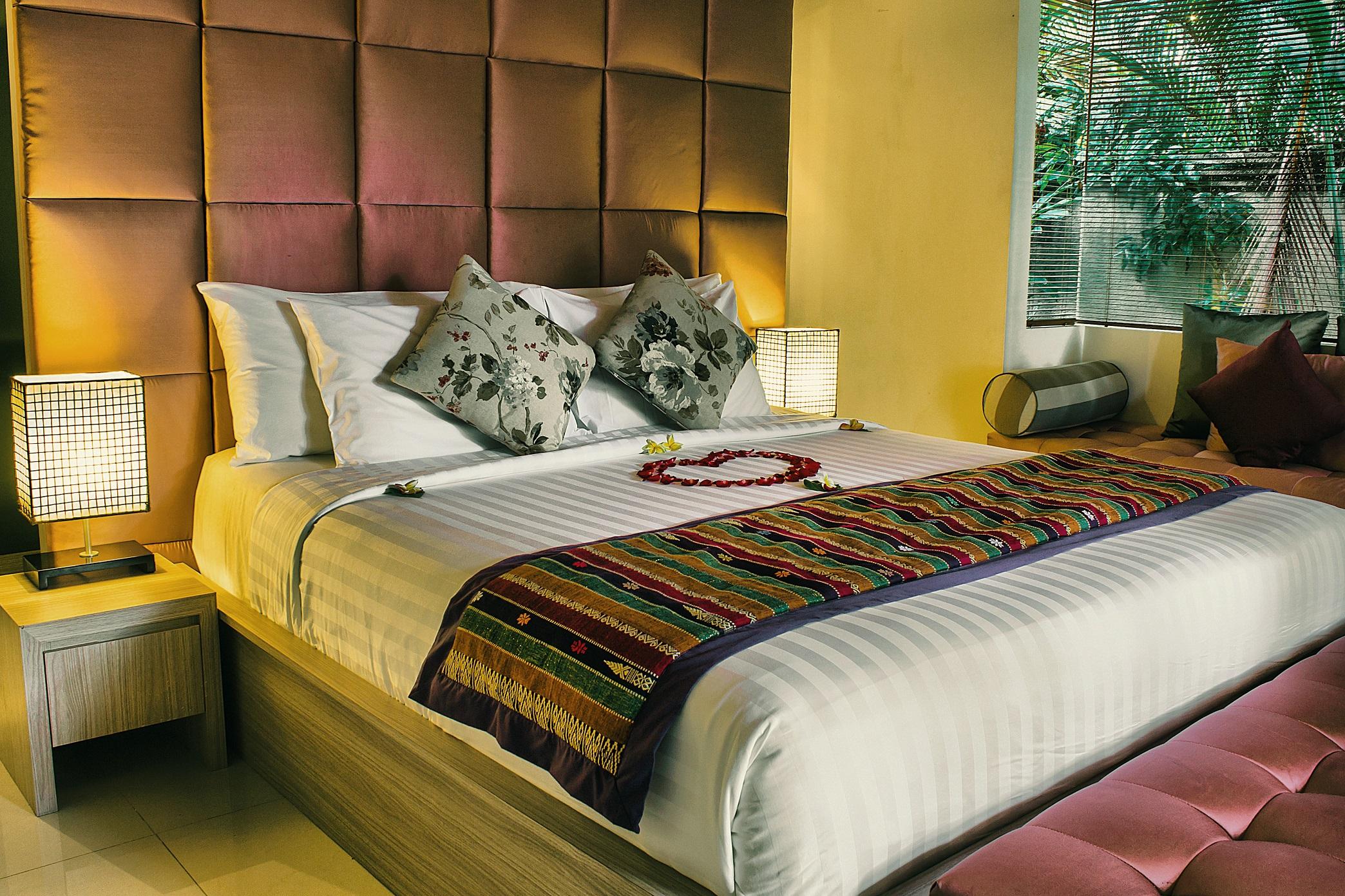 Sagara Villas And Suites Sanur By Ahm Exterior foto A bed