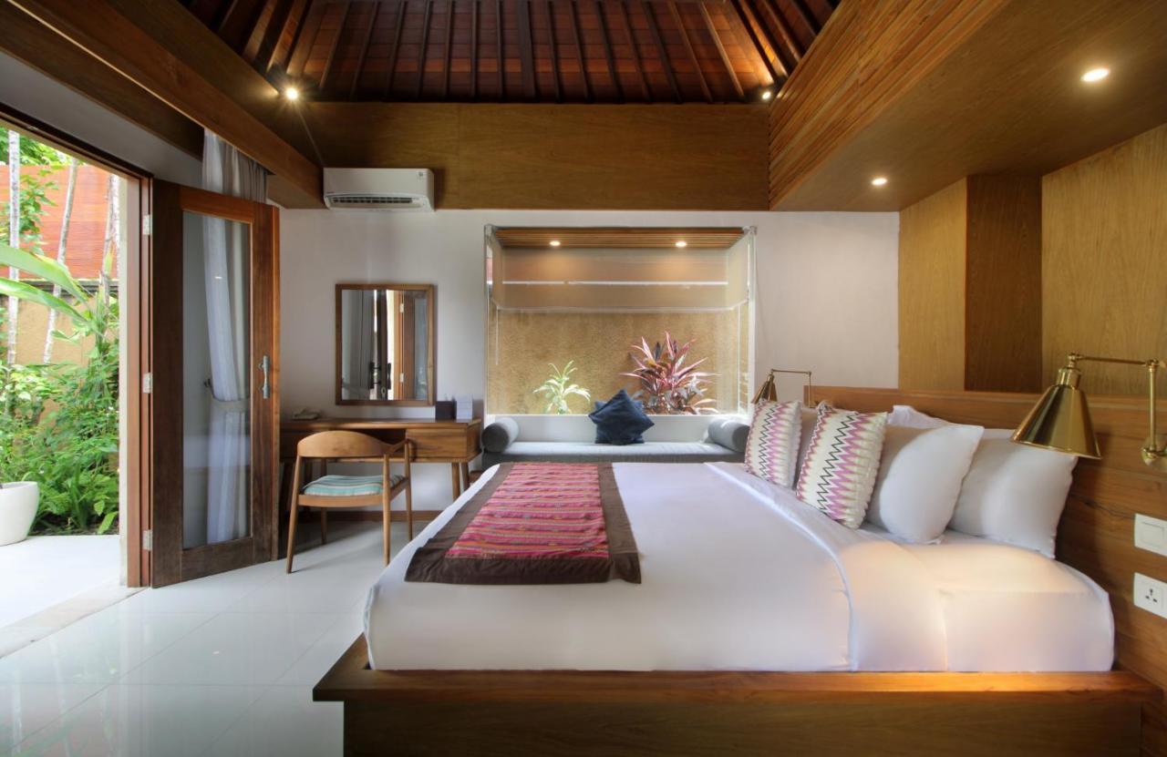 Sagara Villas And Suites Sanur By Ahm Exterior foto A bedroom at the resort