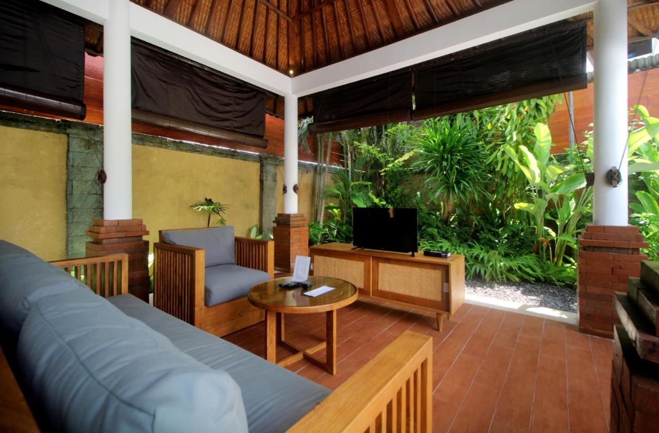 Sagara Villas And Suites Sanur By Ahm Exterior foto Living room of a Beach Villa